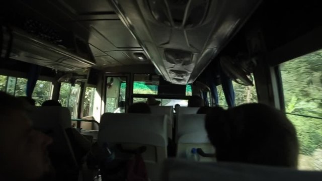 A view from an old asian bus driving through the woods. Nepal, southern Asia.