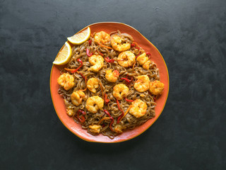 Asian udon noodles with fried shrimps