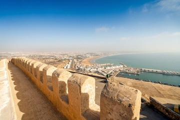 Modern Agadir with wide beach and port seen from old city walls on Oufella Hill, Morocco