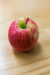 Fresh apple fruit on a wooden table.