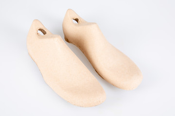 brown shoetree cardboard form for shoes shape the shoe isolated on white background