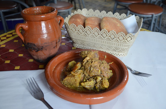 Moroccan Tangia lamb Marrakchia. This slow-cooked Marrakesh dish is traditionally prepared in a clay pot called a tangia. Lamb cooked with preserved lemon in clay pot.