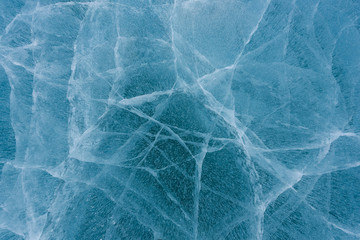 Beautiful ice of Lake Baikal with abstract cracks - Powered by Adobe