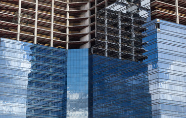 Office building construction. Mirror windows.