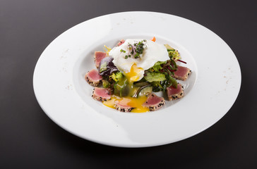 Egg benedict with tuna salad