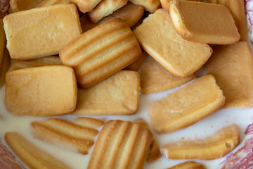Top view of biscuits in milk