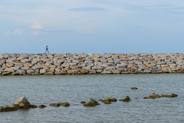 Large stones Was prepared in place of the sandy beach for the wave walls