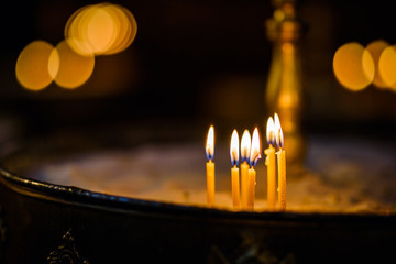 Candles in an orthodox church. Christianity concept