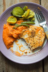 Grilled chicken breast with carrot potato puree, courgette and beans