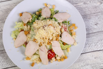 Caesar salad with chicken breast