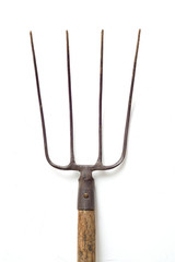 ancient hand made garden fork head on white background