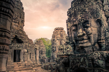 Bayon ancient faces in beautiful sunset