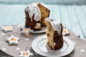 An Easter cake. Delicious dessert. Traditional holiday cake. On a table made of turquoise boards. Festive still life.