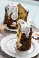 An Easter cake. Delicious dessert. Traditional holiday cake. On a table made of turquoise boards. Festive still life.