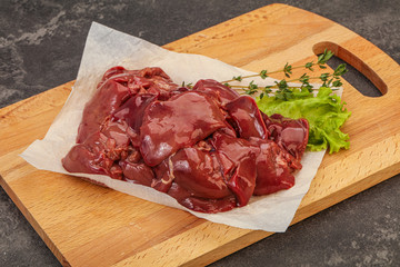 Raw chicken liver over board