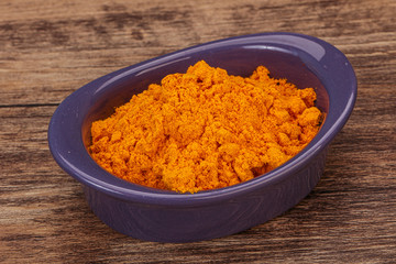 Tumeric powder in the bowl
