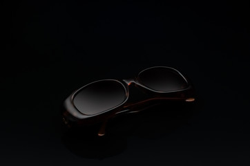 sunglasses are on a black background