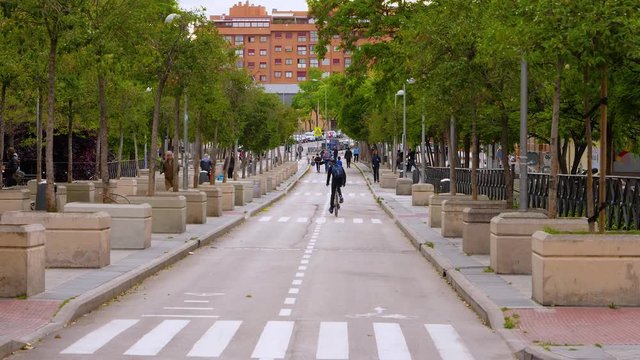 Madrid / Spain-02/05/20. Parents walking with their children while playing in the relaxation of the state of alarm in Arganzuela, Madrid, Spain. Covid 19 pandemic, coronavirus