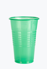 green plastic cup isolated on white