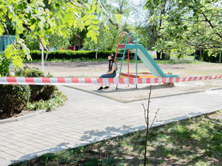 The Playground is fenced with a red ribbon as a result of quarantine to prevent the spread of the pandemic coronavirus.