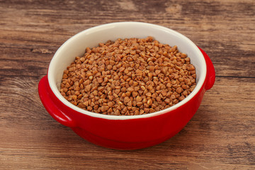 Raw buсkwheat cereal in the bowl