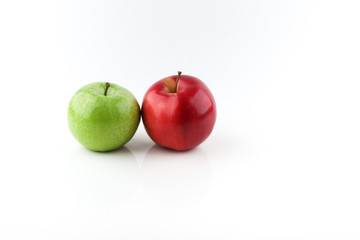 red and green apples on white background