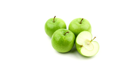 green apples and half of apple  isolated on white background