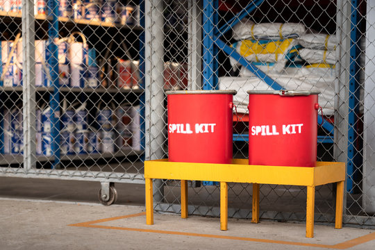 Spill kit containment boxes are prepared and placed in front of the chemical storage room. Using in emergency case of chemical spill or leak on ground.