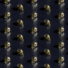 Golden skulls on dark background with bokeh effect - 3D rendering