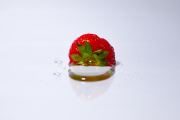 Organic strawberry on a white background. 