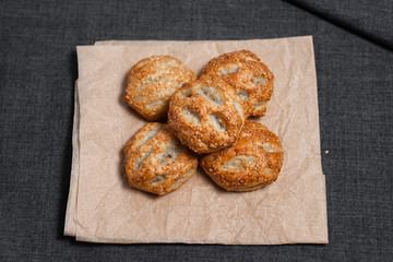 Buns from the furnace craft, food paper
Photo on a dark background