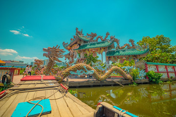view of Phu Chau Temple, is located in the middle of a branch of the Saigon River, with a age of 3 centuries and is widely sought after by the sacred.