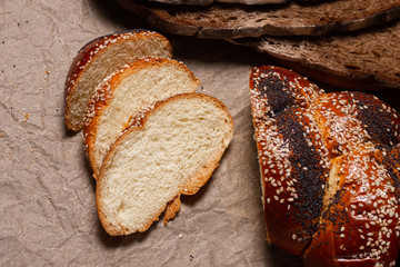 Baking, rolls, bread and milk on a dark background