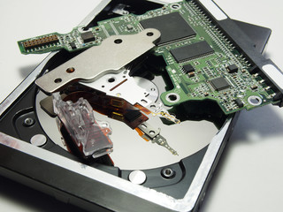Hard drive, electronic and mechanical parts close-up. Components of electronic devices, macro photos.