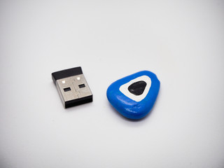 Blue bead against evil eye with flash memory