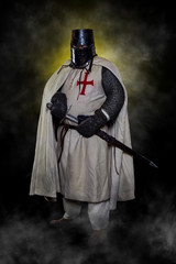 Templar knight with helmet and sword