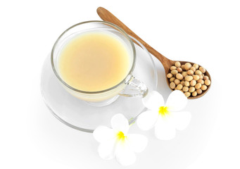 Obraz na płótnie Canvas Soymilk in glass with soy beans in wooden spoon isolated on white backgroun, health care concept