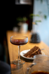 Pour over black coffee hario with cake on table coffee house cafe serving kettle