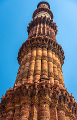 Fototapeta na wymiar Close Up view of The Qutb Minar, also spelled as Qutab Minar or Qutub Minar with Balconies. Vintage effect is used.