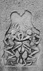 Bas-relief of dancers at a ruined temple in Angkor Wat - Cambodia