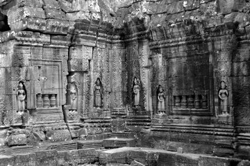 Temple adorned with female sculptures in the Angkor Wat complex, Cambodia