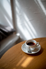 cup of black filter coffee on the table in coffee house cafe coffeebreak sunlight daylight