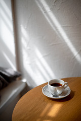 cup of black filter coffee on the table in coffee house cafe coffeebreak sunlight daylight