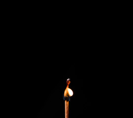 burning matches on a black background