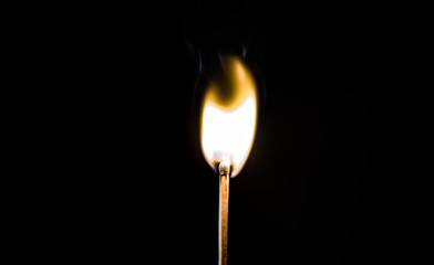 burning matches on a black background