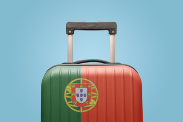 Baggage with Portugal flag print tourism and vacation concept.