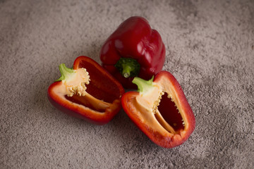  Red pepper lies on a white background