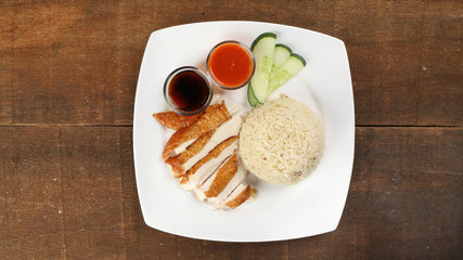 South east asian style chicken rice set steamed roasted sliced chicken with soup dark chilli sauce malaysia china