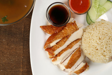 South east asian style chicken rice set steamed roasted sliced chicken with soup dark chilli sauce malaysia china
