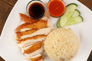 South east asian style chicken rice set steamed roasted sliced chicken with soup dark chilli sauce malaysia china